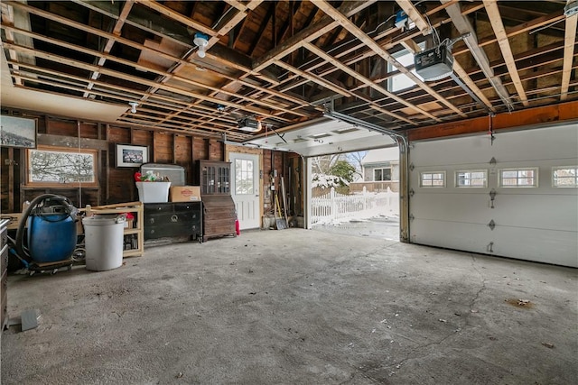 garage featuring a garage door opener