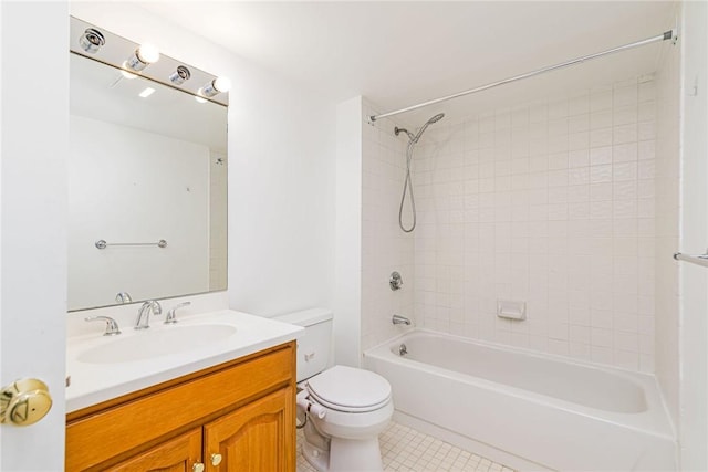 bathroom featuring shower / bath combination, tile patterned flooring, toilet, and vanity