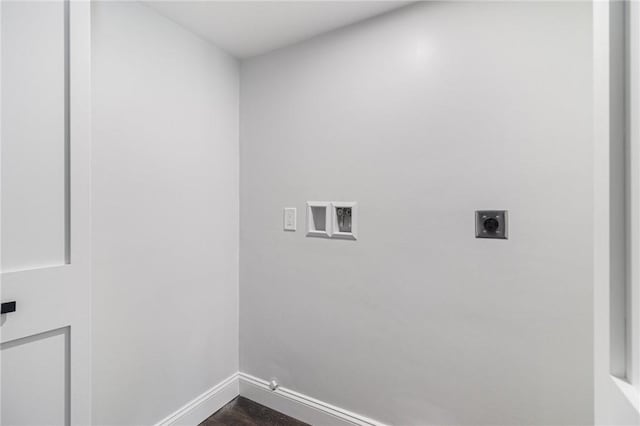 laundry area featuring hookup for a washing machine, electric dryer hookup, laundry area, baseboards, and hookup for a gas dryer