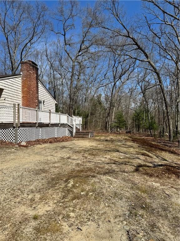 view of yard with a deck