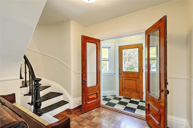 foyer entrance featuring stairs