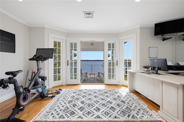 office area featuring recessed lighting, crown molding, visible vents, and light wood finished floors