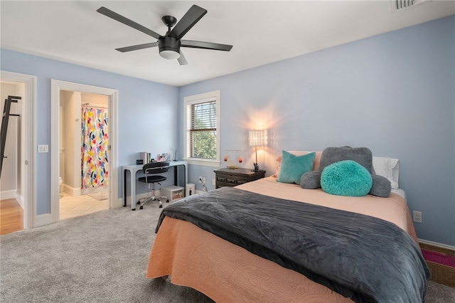 bedroom featuring carpet floors, a ceiling fan, visible vents, and baseboards