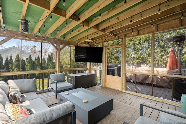 sunroom with an outdoor hangout area