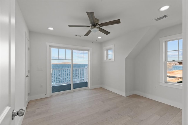 interior space featuring light wood finished floors, visible vents, recessed lighting, and ceiling fan