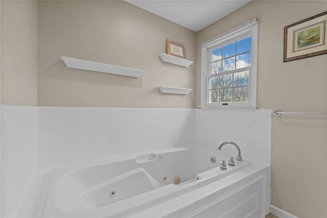 10 David Ct, East Greenwich, RI 02818 - bathroom with a jetted tub and baseboards
