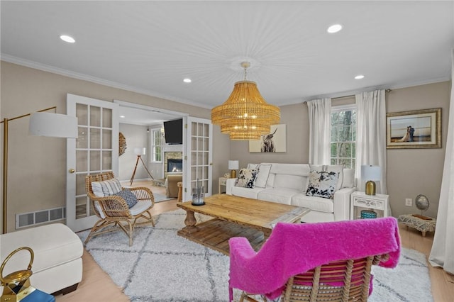 10 David Ct, East Greenwich, RI 02818 - living room featuring wood finished floors, visible vents, french doors, and recessed lighting
