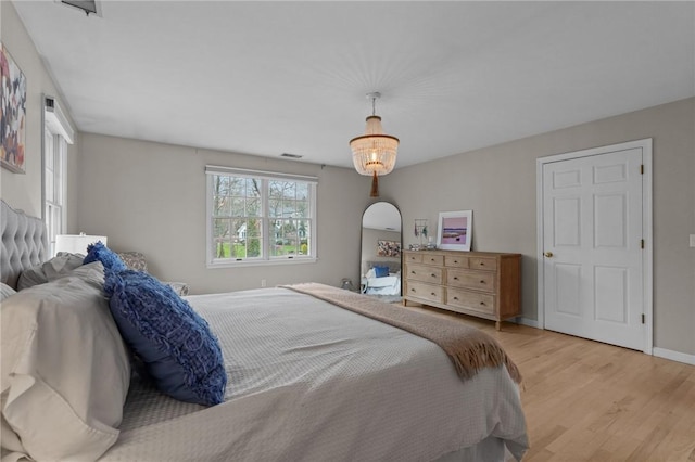 10 David Ct, East Greenwich, RI 02818 - bedroom featuring baseboards, visible vents, and light wood-style flooring