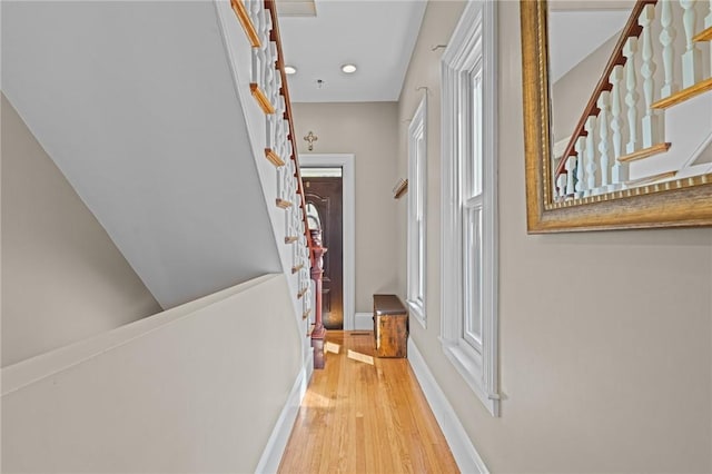 76 Bank St, North Attleboro, MA 02760 - hallway featuring baseboards, wood finished floors, recessed lighting, and stairway