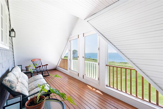 29 Reliance Dr, Bristol, RI 02809 - additional living space with wood-type flooring, vaulted ceiling, and a water view
