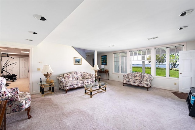 29 Reliance Dr, Bristol, RI 02809 - living room with baseboards, visible vents, and carpet floors