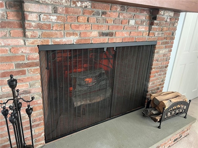 29 Reliance Dr, Bristol, RI 02809 - detailed view of a fireplace and brick wall