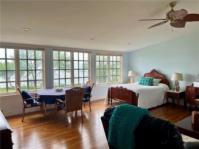 29 Reliance Dr, Bristol, RI 02809 - bedroom with multiple windows, wood finished floors, a ceiling fan, and recessed lighting