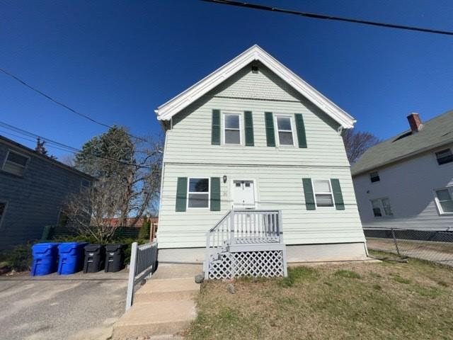 view of front of house with fence