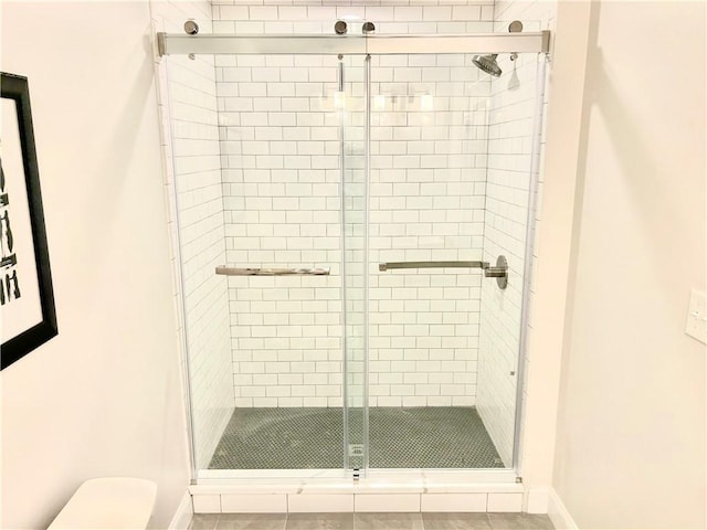0 Greenwich Blvd Unit 203, East Greenwich, RI 02818 - full bath featuring a stall shower, toilet, and baseboards