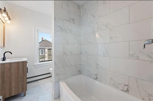 full bath with a baseboard heating unit, marble finish floor, vanity, and toilet
