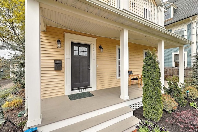 property entrance featuring covered porch