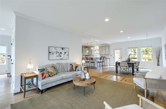 living area with recessed lighting and light wood-type flooring