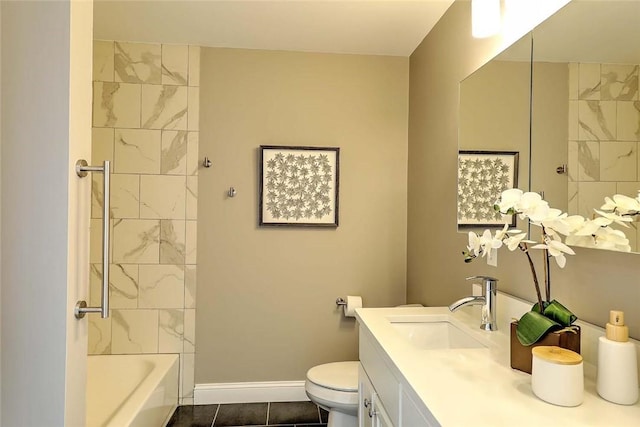 bathroom with baseboards, vanity, toilet, and tub / shower combination