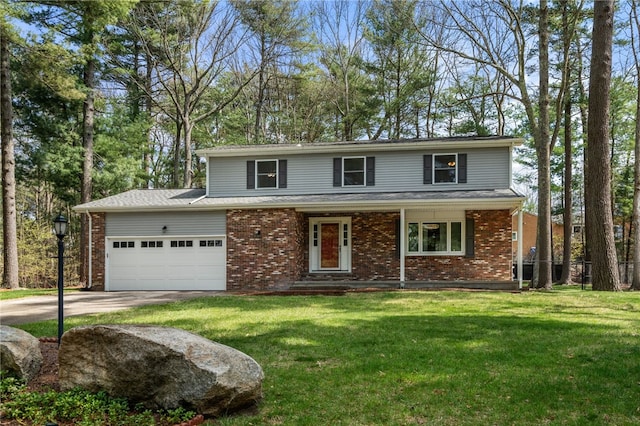 traditional-style house with an attached garage, driveway, and brick siding