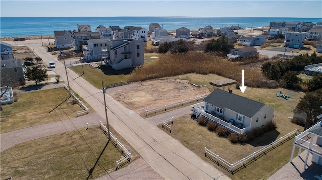aerial view with a residential view and a water view
