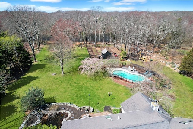 view of property location featuring a pool area