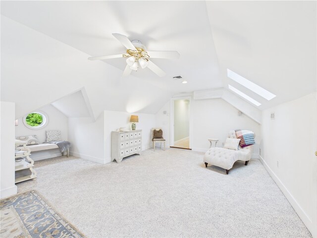 50 Intrepid Ln, Jamestown, RI 02835 - carpeted bedroom with lofted ceiling, a skylight, ceiling fan, and baseboards
