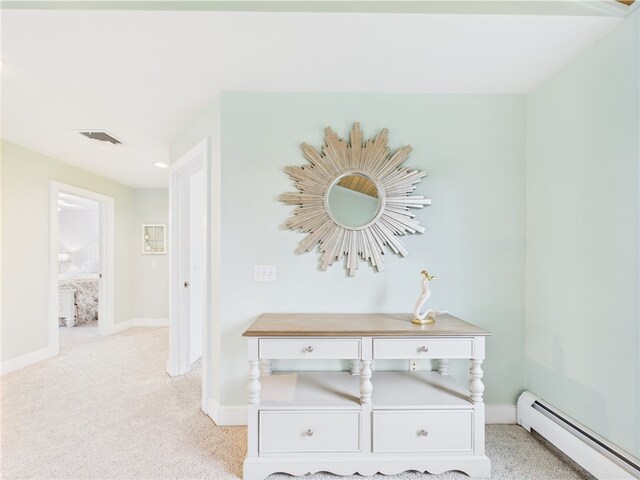 50 Intrepid Ln, Jamestown, RI 02835 - corridor featuring baseboard heating, baseboards, and carpet