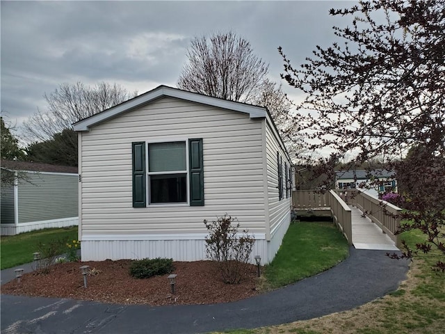 65 Wright Way, Coventry, RI 02816 - view of side of property with a yard