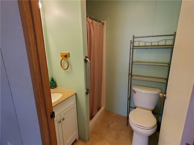 65 Wright Way, Coventry, RI 02816 - bathroom with vanity, tile patterned floors, a stall shower, and toilet
