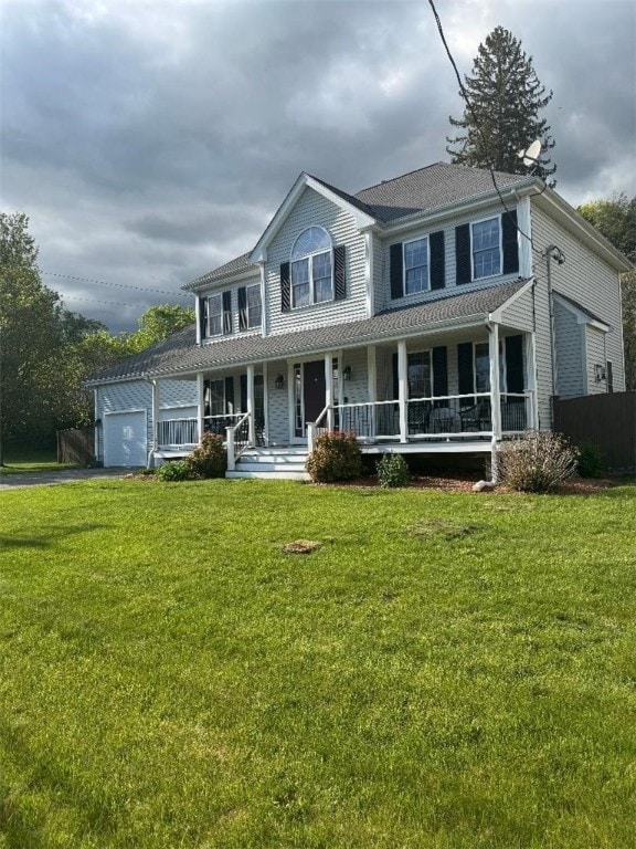 1010 Oakhill Ave, Attleboro, MA 02703 - view of front of house featuring an attached garage, a porch, and asphalt driveway