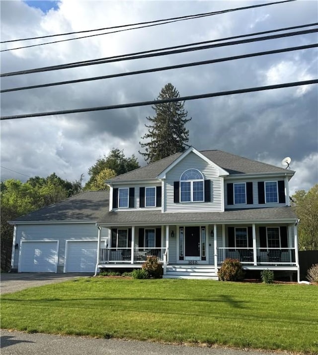 1010 Oakhill Ave, Attleboro, MA 02703 - colonial house with a porch, an attached garage, driveway, a front yard, and roof with shingles