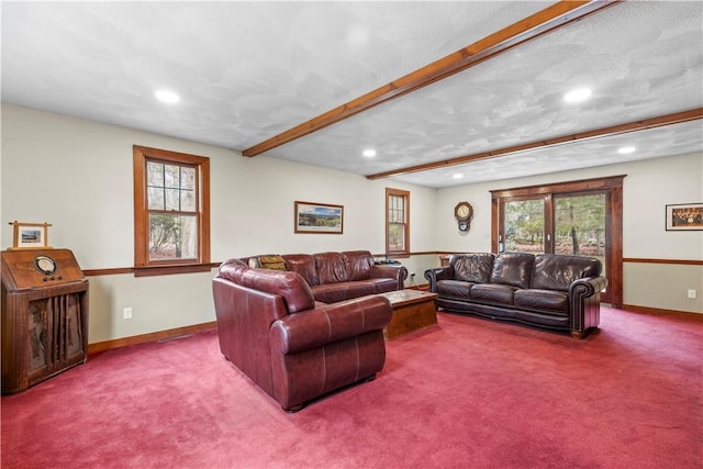 living area featuring recessed lighting, beam ceiling, and carpet flooring