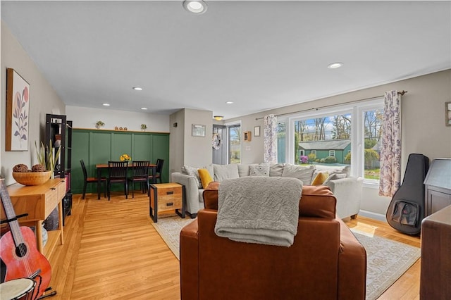 living area featuring recessed lighting and light wood-type flooring