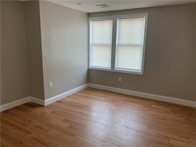 88 Reed St, Warwick, RI 02886 - empty room featuring light wood-type flooring