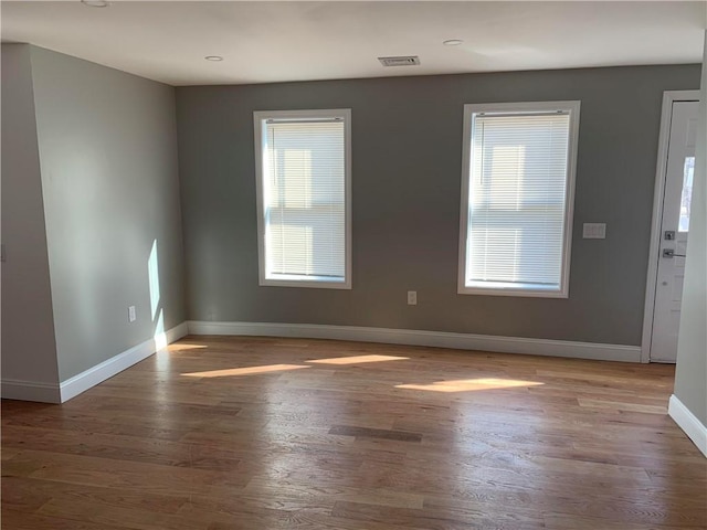 88 Reed St, Warwick, RI 02886 - entryway with plenty of natural light and wood finished floors