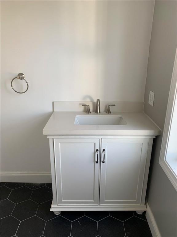 88 Reed St, Warwick, RI 02886 - bathroom featuring vanity and tile patterned floors