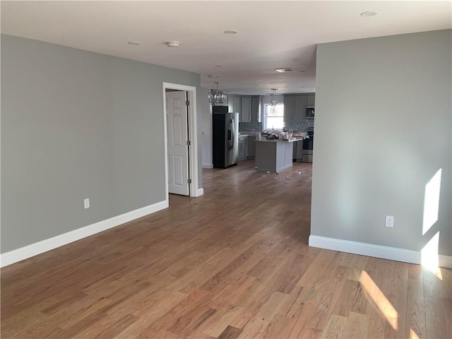 88 Reed St, Warwick, RI 02886 - interior space with baseboards and wood finished floors