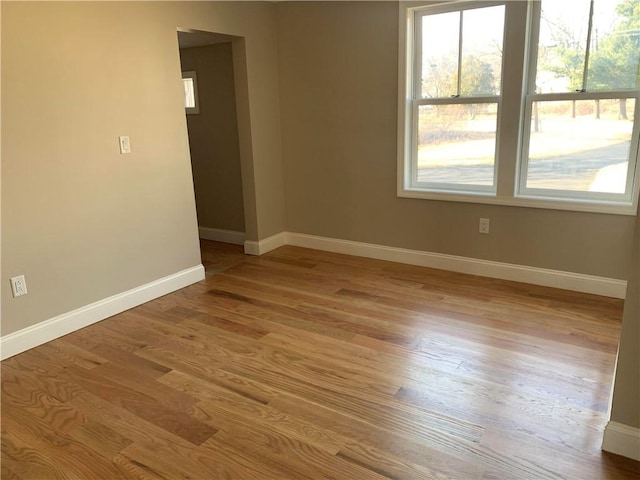 88 Reed St, Warwick, RI 02886 - unfurnished room with light wood finished floors and baseboards