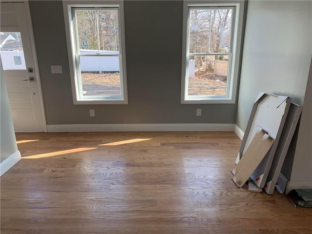 88 Reed St, Warwick, RI 02886 - interior space featuring wood finished floors and baseboards