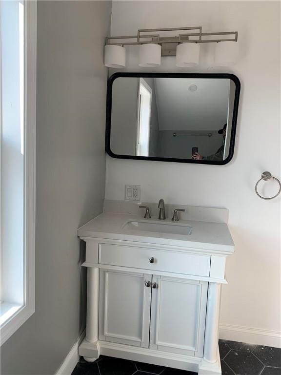 88 Reed St, Warwick, RI 02886 - bathroom with vanity and tile patterned floors