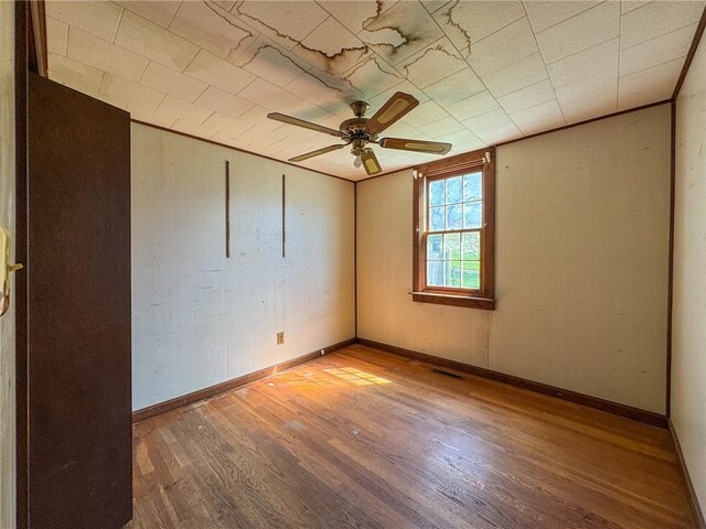 8 Tucker Ave, Tiverton, RI 02878 - empty room featuring a ceiling fan and wood finished floors