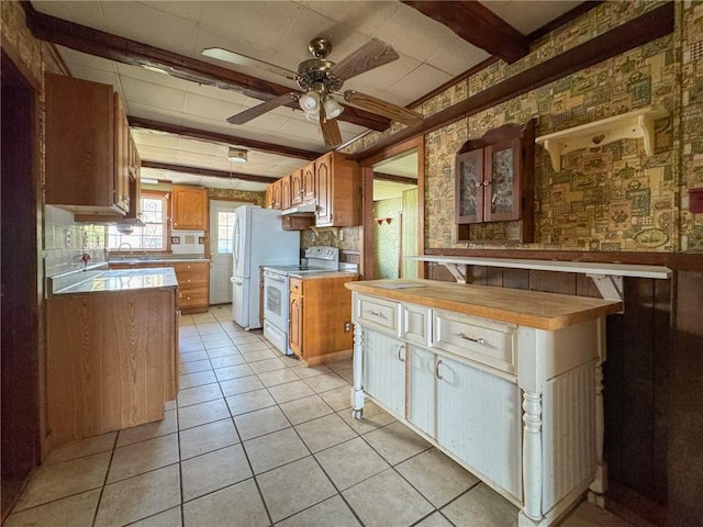 8 Tucker Ave, Tiverton, RI 02878 - kitchen featuring light tile patterned flooring, wallpapered walls, a ceiling fan, white appliances, and light countertops
