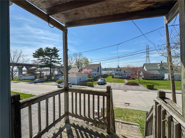 8 Tucker Ave, Tiverton, RI 02878 - wooden terrace featuring a yard and a residential view
