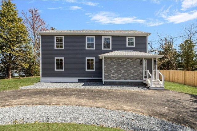 view of front of property with fence