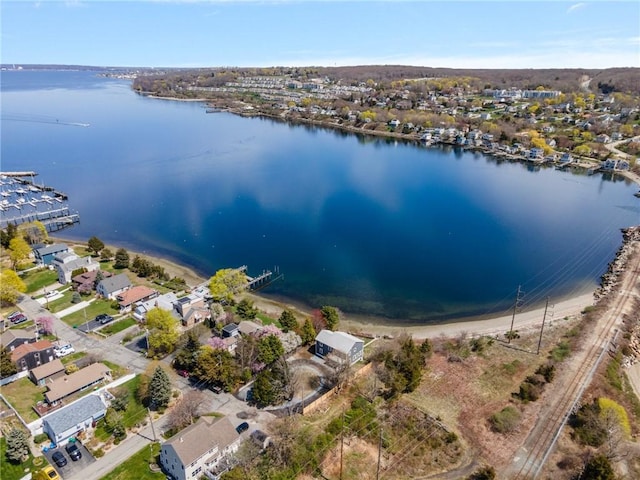 birds eye view of property with a residential view and a water view