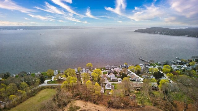bird's eye view featuring a water view and a residential view