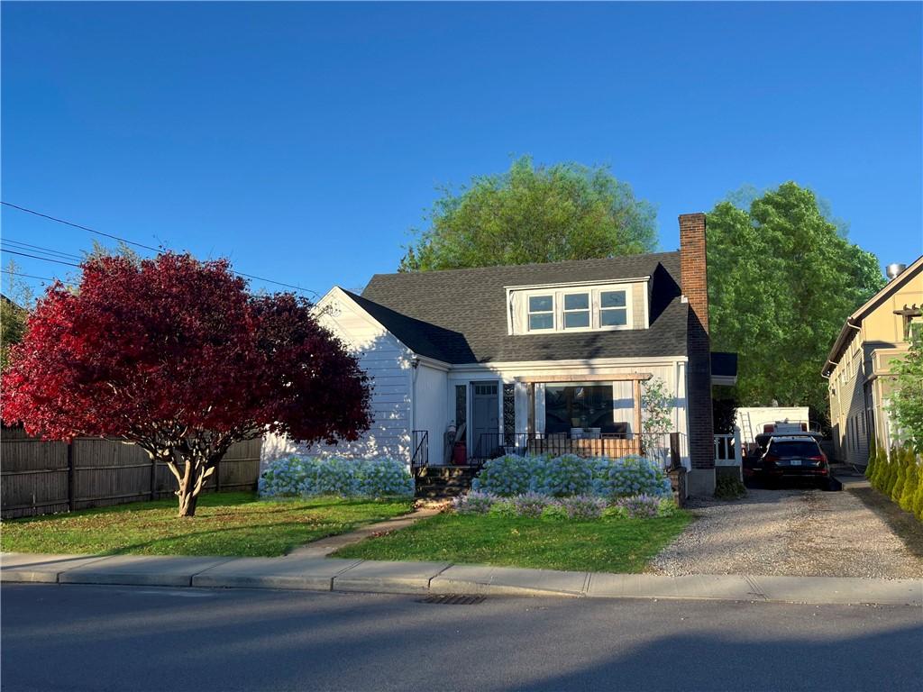 52 Spruce St, Westerly, RI 02891 - view of front of property featuring a chimney and roof with shingles