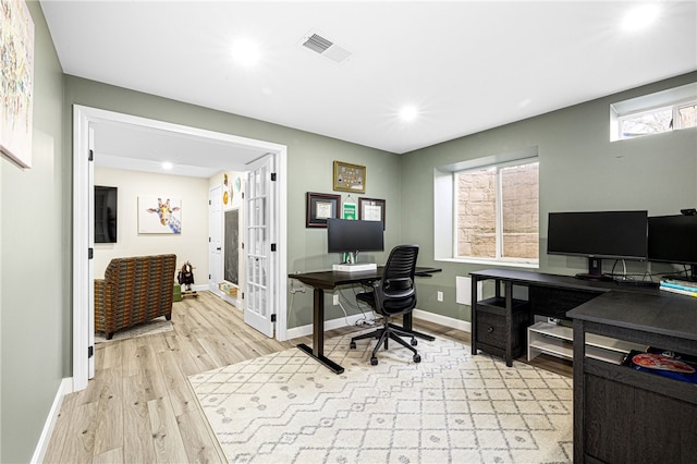 office area with light wood-style floors, french doors, recessed lighting, baseboards, and visible vents