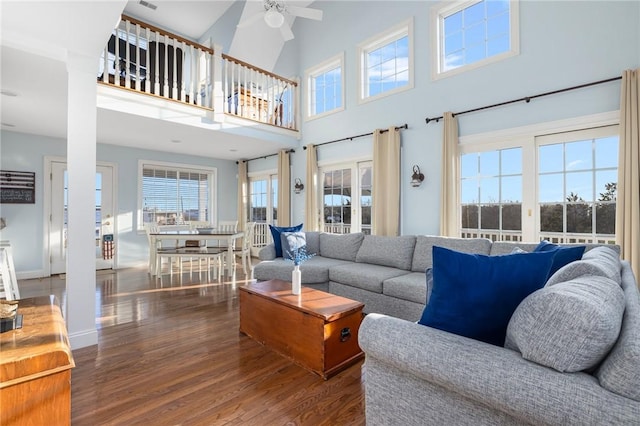 57 Foster St, Warwick, RI 02889 - living area with a ceiling fan, plenty of natural light, a towering ceiling, and wood finished floors